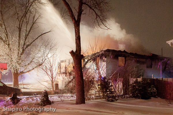 Lincolnshire Riverwoods firefighters battle a winter houe fire at 20538 Clarice in Prairieview 1-20-14 Larry Shapiro photography